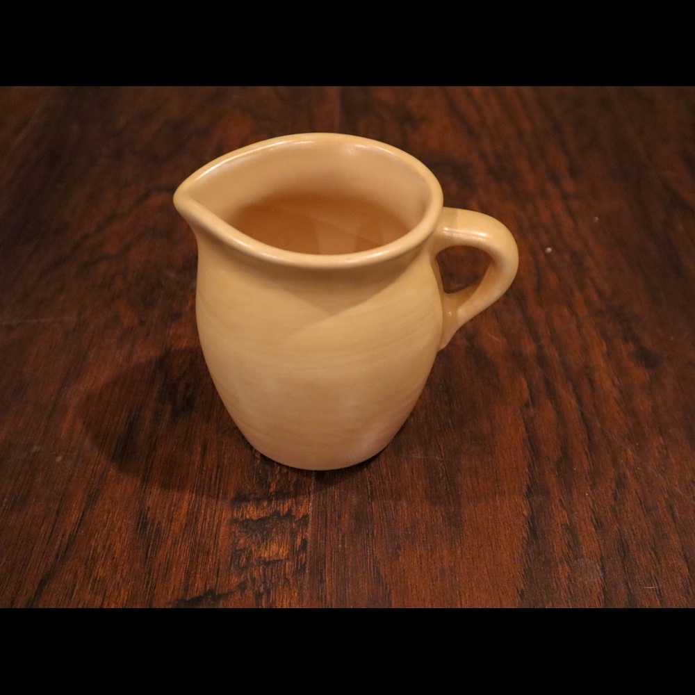 Cream yellow pitcher